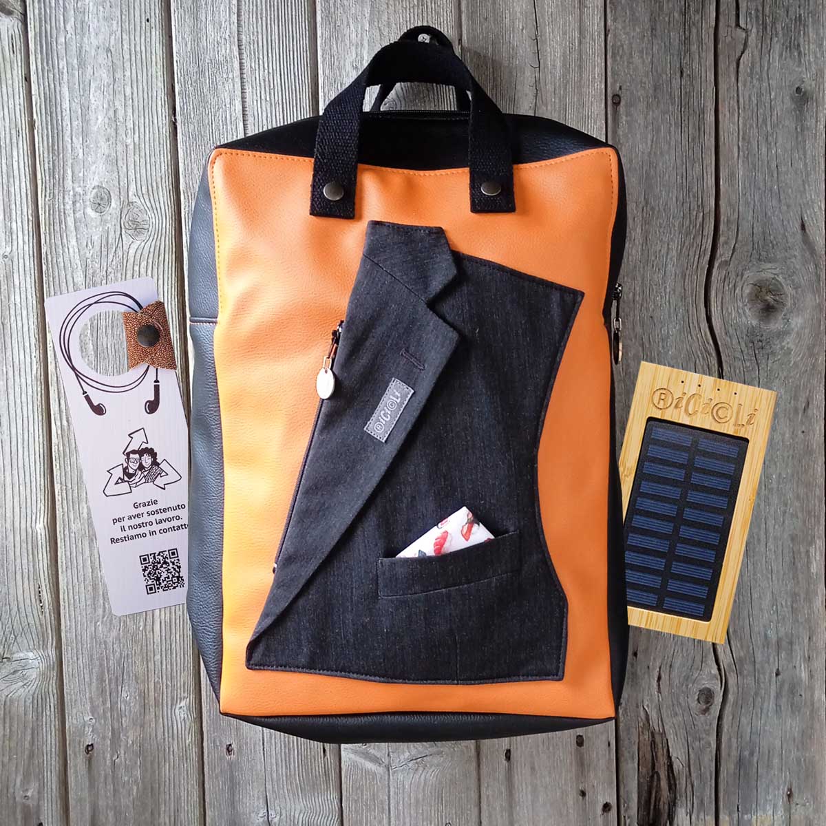 Ricicli Design Borse Zaino Apollo n.07 nero arancione con power bank solare