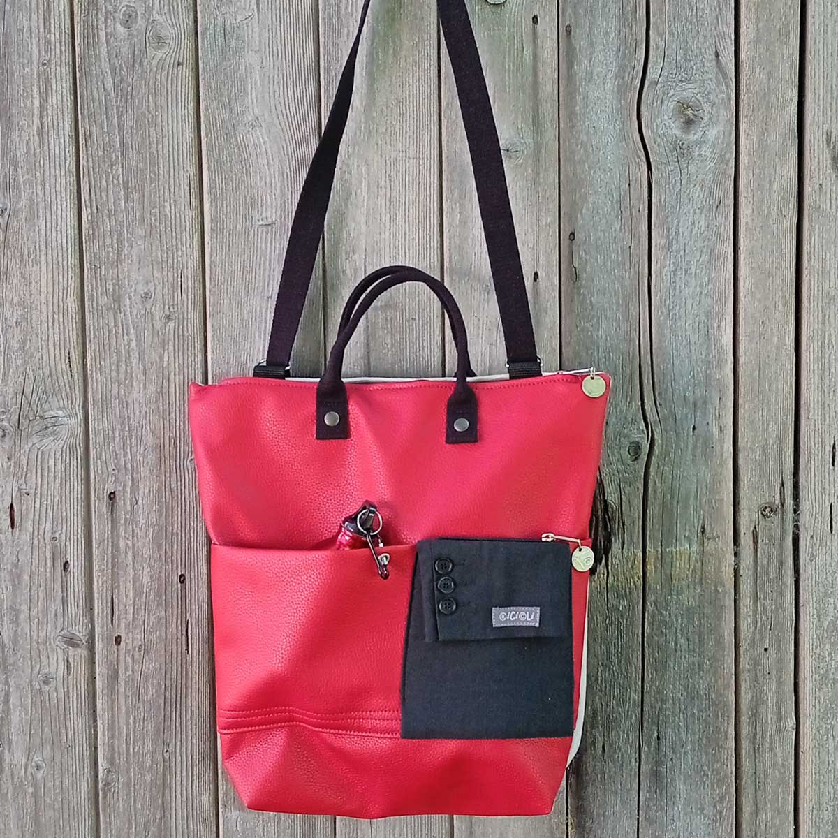 Ricicli Design Borse Greta n°014 borsa zaino rossa in ecopelle con borraccia